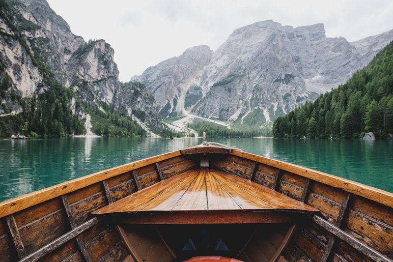 View from a wooden boat on a pristine mountain lake
